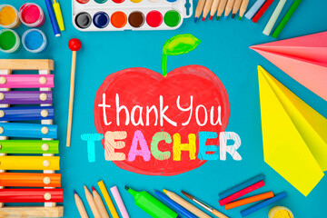 Childish lettering for Teachers' Day. Appreciation of teachers top view flat lay concept. Colored...