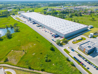 Aerial view of distribution center, drone photo of industrial logistics zone,new super modern...