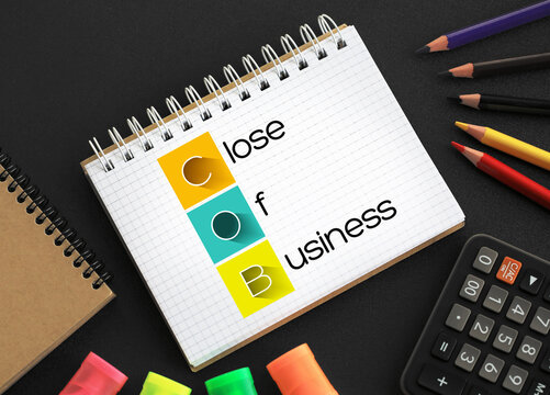 COB - Close of Business acronym on notepad, concept background
