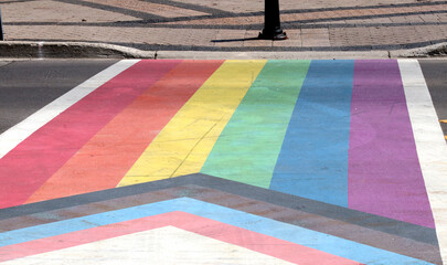 Pride Rainbow LGBT Sidewalk Crosswalk on city road close up
