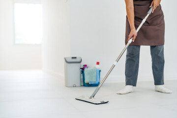 Asian woman House wife or housekeeper cleaning at home..