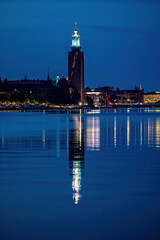 Fototapeta premium Stockholm, Sweden A view of the City Hall or Stadshuset at night in the summer.
