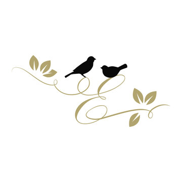 birds on a branch, golden letter e