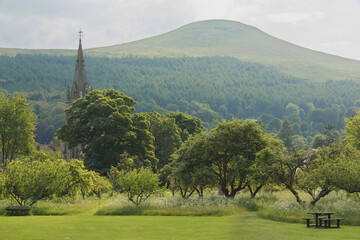 Landscape view of Lomond Hills Regional Park from from the landscaped gardens of Falkland Palace on a sunny summer day in Fife, Scotland, UK.