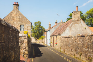 Quaint and charming country lane in the historic old town village of Falkland on a sunny summer day in Fife, Scotland, UK.