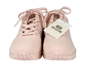 Women's sneakers with a sale tag or a price card isolated from background. I am the author of the...