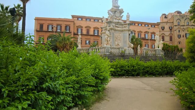 View of Palermo Cathedral with 4 bell tower top, architecturally diverse church, and housing royal tombs. Impressive cathedral church of the Roman Catholic Archdiocese of Palermo in Sicily, Italy.