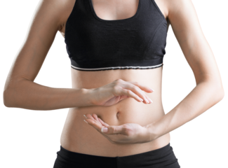 Female in a sports bra making a circle with her hands around her abdomen