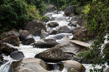 Tamesis Antioquia - Fast river with stones that comes down from the mountain - obrazy, fototapety, plakaty