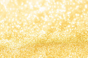 Gold glitter defocused texture background. gold christmas abstract background.