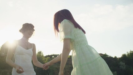 An adventurous lesbian couple explores new horizons, savoring their vacation by the ocean, where love, happiness, and the LGBTQ spirit intertwine