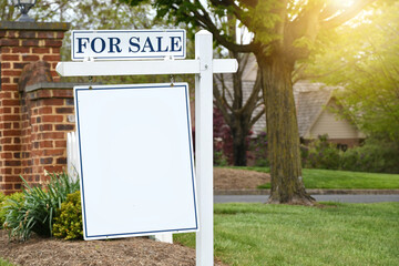 For Sale sign in front of home suitable for mock up. Real estate housing market - add your design