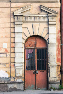 old door on the vintage facade. architectural element