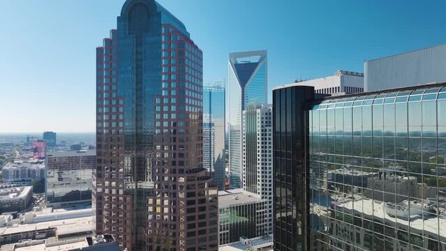 Aerial view of downtown district of Charlotte city in North Carolina, USA. Glass and steel high skyscraper buildings in modern american midtown