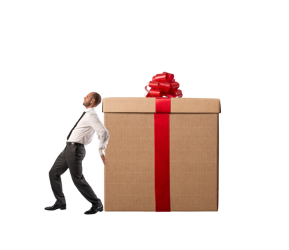 Tired businessman pushes heavy great christmas gift