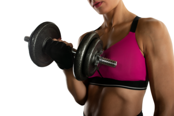 Isolated woman trains in the gym with weights