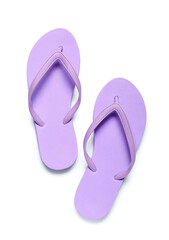 Pair of lilac flip-flops on white background