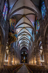 Fototapeta premium Strasbourg, France - June 19, 2023: Interior of the famous cathedral of Strasbourg. It is widely considered to be among the finest examples of late, Gothic architecture