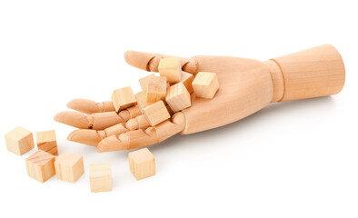 Wooden hand with cubes isolated on white background
