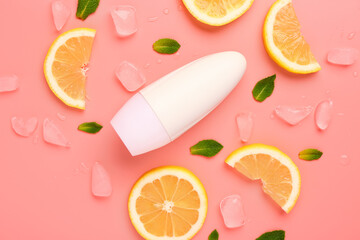 Deodorant with orange slices, mint and ice on color background