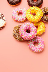 Sweet donuts on pink background
