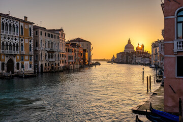 Fototapeta na wymiar The Grand Canal in Venice with the Santa Maria della Salute basilica at a beautiful sunrise, Italy, Europe.