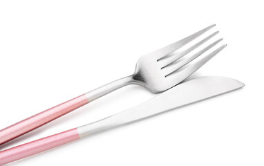 Stainless steel fork and knife with pink handles on white background