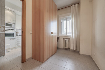 Small service bedroom with two-section wardrobe