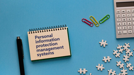 There is notebook with the word Personal information protection management systems. It is as an...
