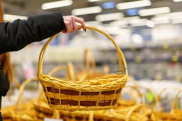 Decorative basket for food in a wholesale and retail store. Background with selective focus and copy space