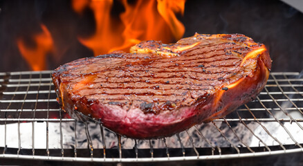 delicious meat roasted on a spit with fire