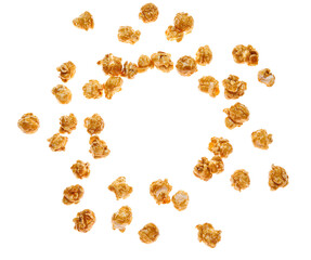 Fototapeta premium Frame made of flying tasty caramel popcorn on white background