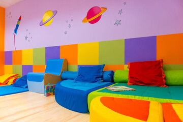 Interior of a kindergarten, decorated with colored cushions