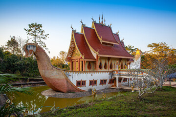 scenery The beautiful Suphannahong boat was builted in the pool at Sancomfu temple Chiang Rai...