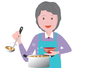 高齢者の女性が食卓の準備をしている。