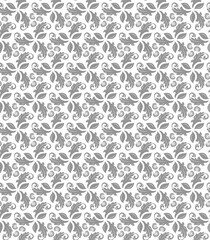 Floral ornament. Seamless abstract classic background with gray leaves. Pattern with repeating floral elements. Ornament for fabric, wallpaper and packaging