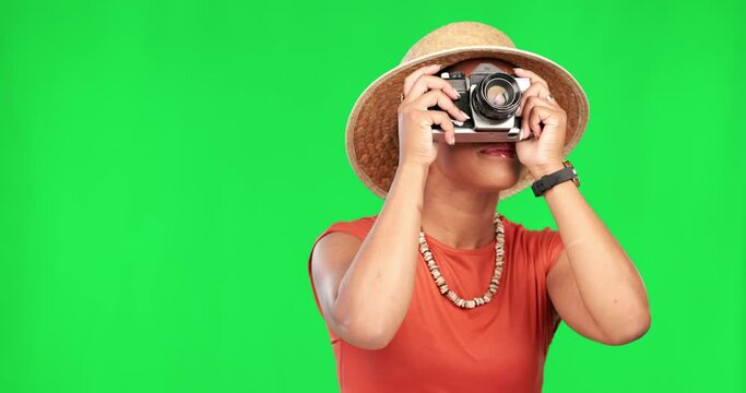 Green screen, photographer and woman on vacation, holiday or tourist with camera for travel, memory and photography of adventure. Film, photo and person on tour, journey and happiness on summer trip