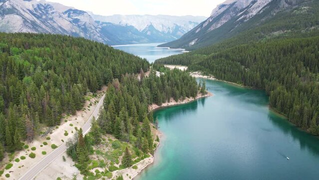 drone shot of lake two jack and and lake Minnewanka together in the Canadian Rockies,  Banff National park