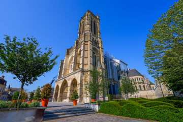 Basilica-cathedral of Soissons, dedicated to Saint Gervais and Saint Protais in the French Aisne department in Picardy - Medieval roman catholic cathedral in the North of France - obrazy, fototapety, plakaty