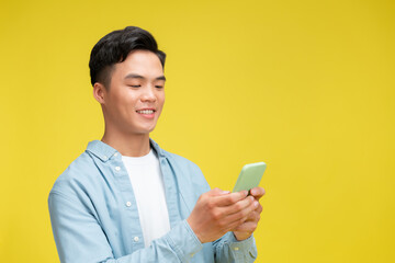 Portrait young Asian man handsome in formal shirt using smartphone trading or chatting