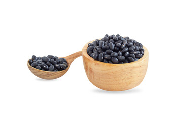Closeup black beans seeds in wooden bowl on white background, healthy food concept