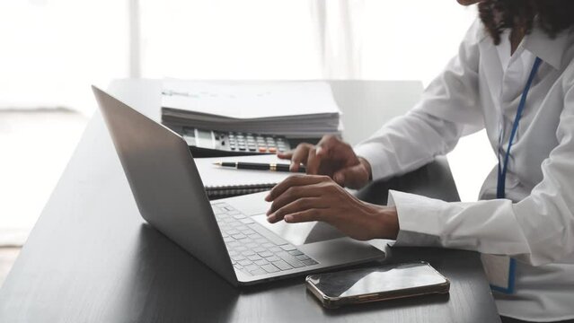 African American Business woman hard working, debtor, deferred debt, Times Interest Earned, Subsidiary Ledger, Special Journal, Shareholders Equity, Scrap value, Price Index, Profitability Ratios
