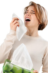 Allergies or cold concept. Young woman blowing nose