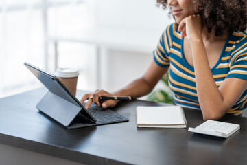 Young female african american student learning chinese language class online lecture via video conference, distance education