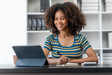 Young female african american student learning chinese language class online lecture via video conference, distance education