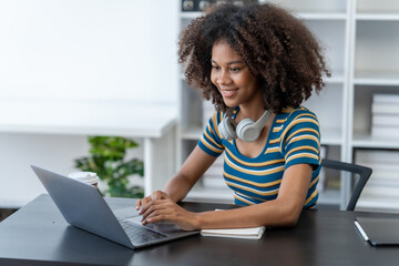 Young female african american student learning chinese language class online lecture via video conference, distance education