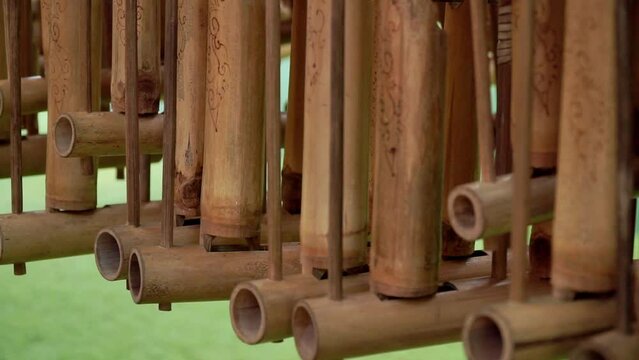 Row of angklung traditional musical instrument. Indonesian traditional music instrument