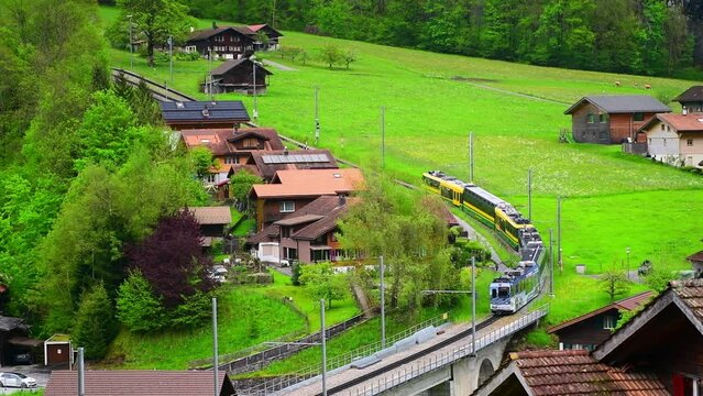  Train for Wengen at Lauterbrunnen valley in Swiss Alps, Switzerland.