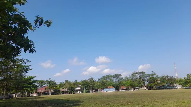 A timelipse  of cloud movement during the day over a field