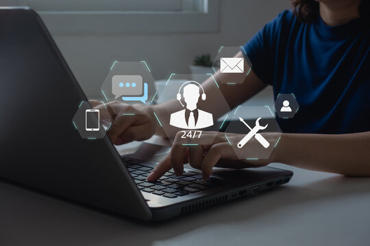 Technical Support Center Customer Service Internet Business Technology Concept. online technical support, and customer service 24/7 nonstop. Business people using laptop with helpdesk icon on screen.